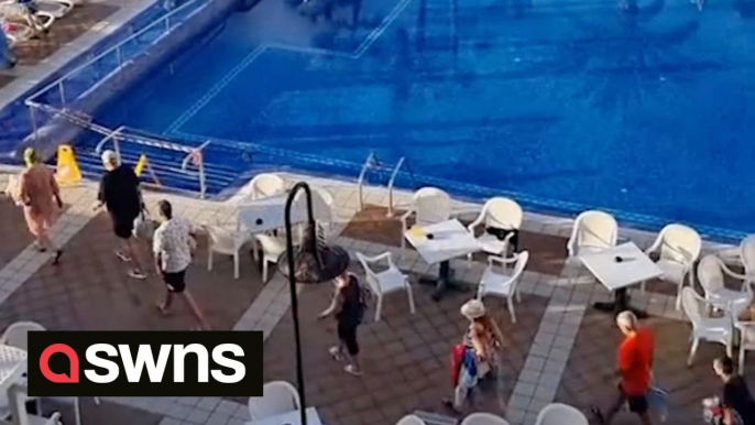 Brits abroad flood to claim sunbeds after queuing since 7am for the pool to open