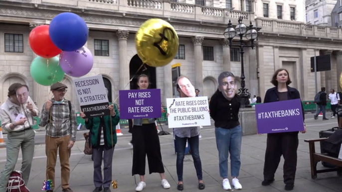 Campaigners gather outside Bank of England against the rises in interest rates amid the cost of living crisis