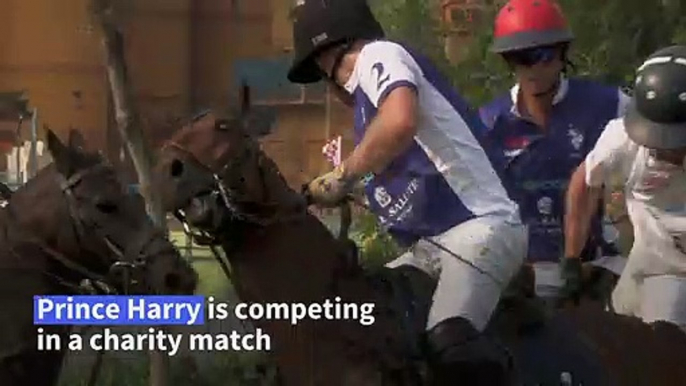 Prince Harry saddles up for charity polo match in Singapore