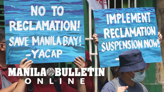 PAMALAKAYA fisherfolk members protest to demand ‘immediate revocation’ of environmental permits for reclamation and dredging activities off Manila Bay