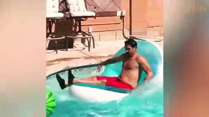 Unexpected Poolside Plunge: Hilarious Inflatable Mat Mishap!