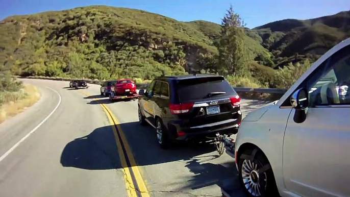 Jeep Grand Cherokee SRT8 2012 vs. BMW X5  2011 M vs. Porsche Cayenne Turbo 2011