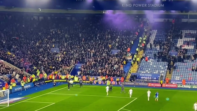 Leeds United fans celebrate a huge win at Leicester