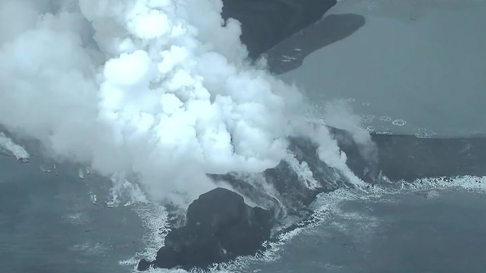 Japanese volcano spews ash and smoke in spectacular eruption