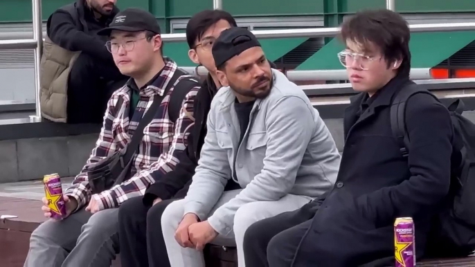 Sitting between a group of strangers prank - joker pranks latest