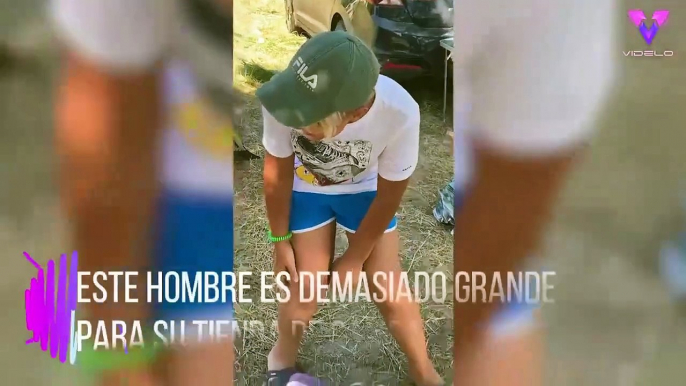 Este hombre es demasiado grande para su tienda de campaña