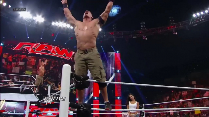 John Cena and AJ Lee kiss after Cena's victory over Dolph Ziggler Raw, Nov. 26, 2012