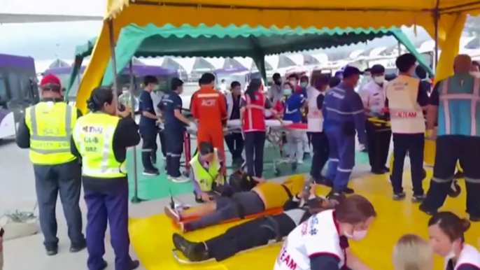 Injured passengers treated on airport tarmac after Singapore Airlines flight hits severe turbulence