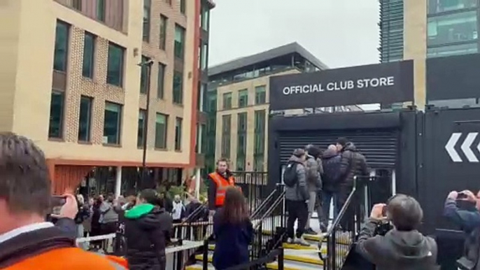 Newcastle United supporters queue for the release of the Adidas home shirt