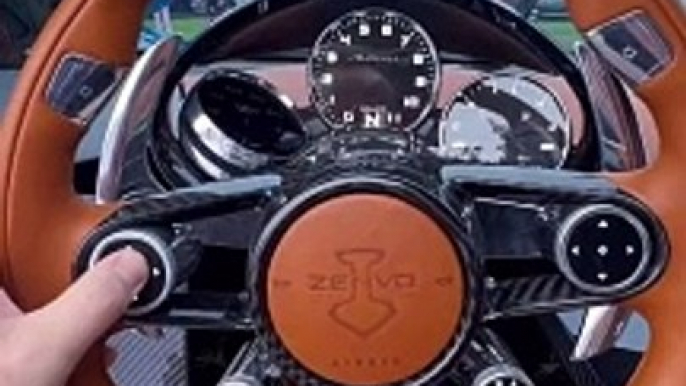 Swiveling screens on a million dollar car? The Zenvo Aurora has no infotainment screen but has two dials that spin, one if you signal a lane change to show a screen with a blind-spot camera image and the other an i