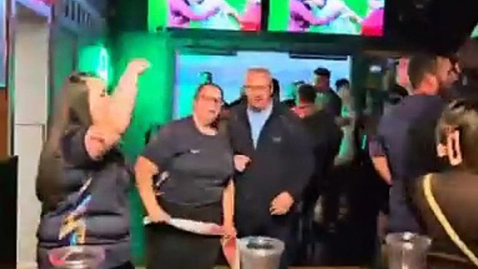 England football fans celebrate Euro 2024 semi final win against The Netherlands at The Met Sports Bar in Walsall