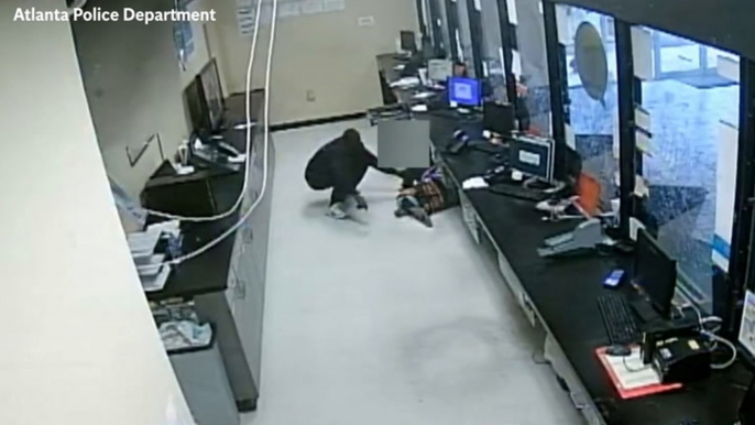 Video: Masked men crash through ceiling in $150,000 shop robbery