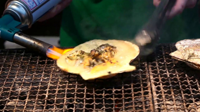 Sizzling Grilled Shellfish with Cheese: A Taste of Japanese Street Food Delights!"