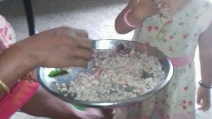 Adorable cute Babie wants to finish the plate by her own. .