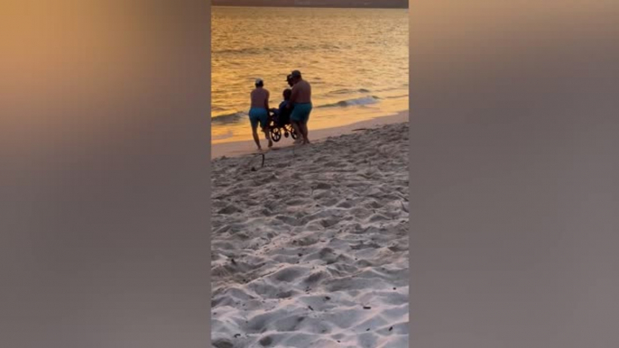 Woman In Wheelchair Carried Into The Ocean To Watch Beautiful Sunset | Happily TV