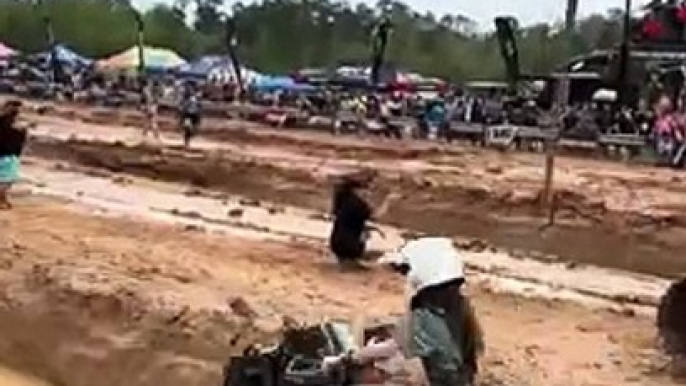 Young ATV rider is competing in the Southern Bounty to see who can get through the mud hol