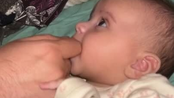 Baby Prefers Father's Finger Over Pacifier