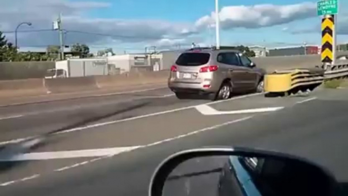 A car driving on the highway without tire... Insane driver!