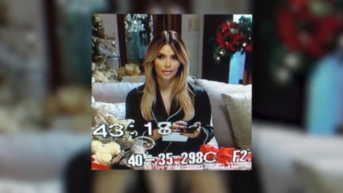 Kim Kardashian Shares Selfies in Her Dressing Gown From the Kardashian Christmas Special