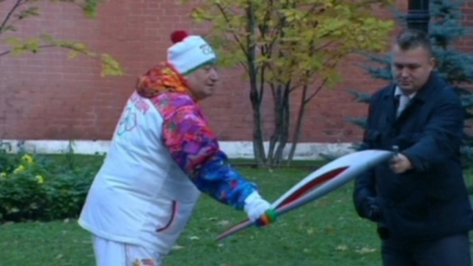 Olympic flame re-lit as Russia kicks off Sochi 2014 Olympic torch relay