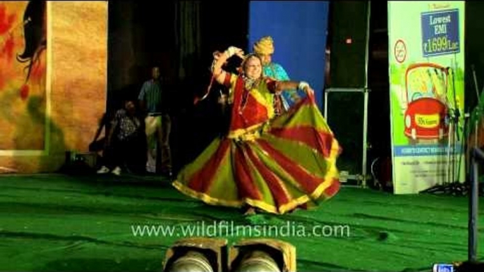 Rajasthani artist performing folk dance at CR Park Durga Puja