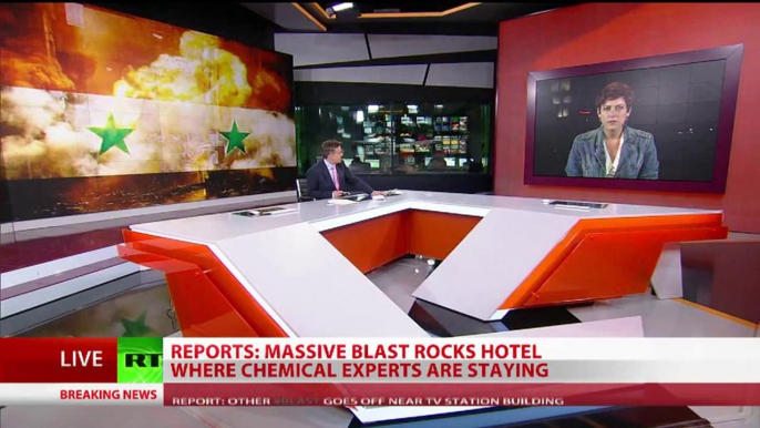 Syrian TV, chemical inspectors' hotel targeted in bomb attacks in Damascus