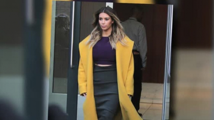 Kim Kardashian Slams Plastic Surgery Rumors About Her Baby Weight