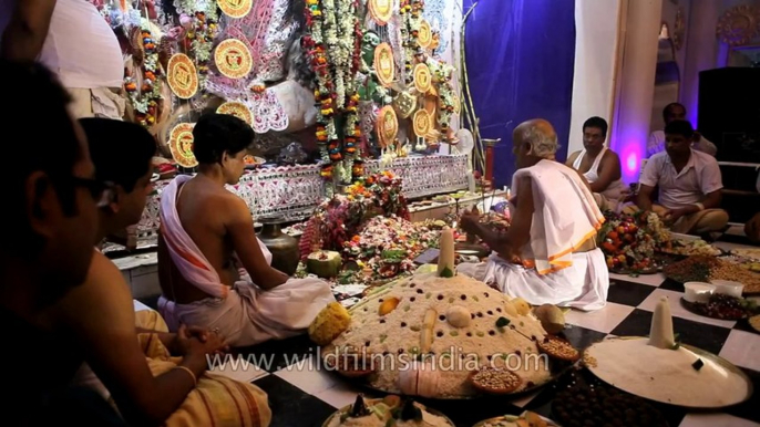 Holy smoke and the devotees: Kolkata Durga Puja