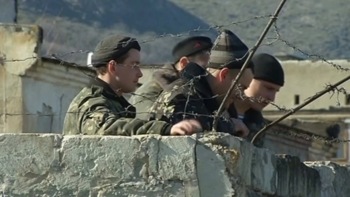 Tense standoff with Russian forces at Crimean military base