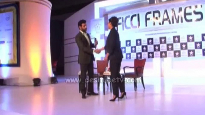 Priyanka Chopra poses on stage during FICCI Frames 2014