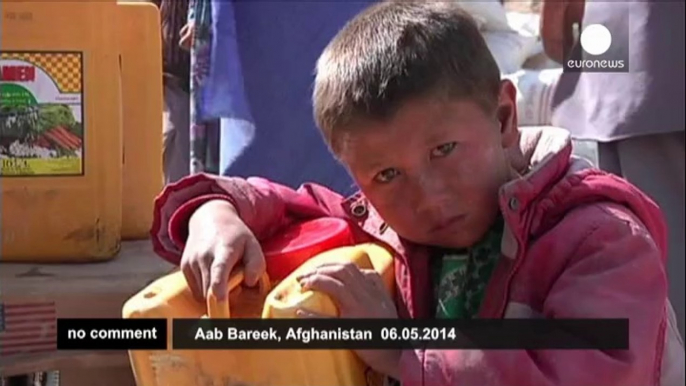 Afghan President Hamid Karzai visits landslide victims