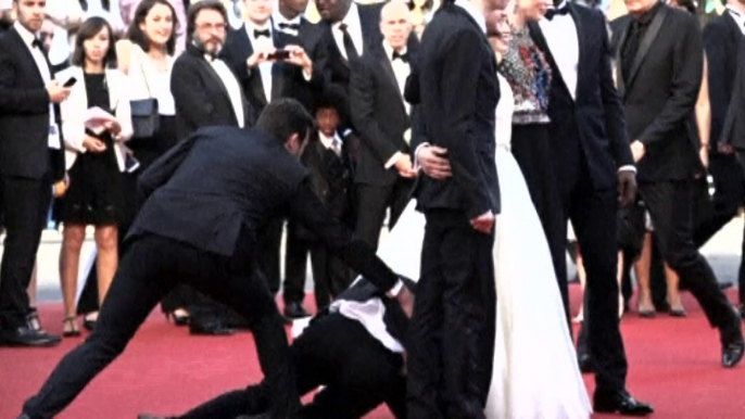 Man hides under America Ferrera's dress at Cannes