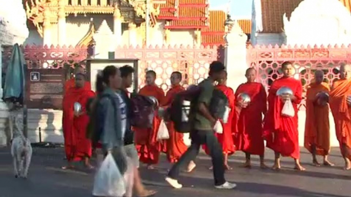 Bangkok wakes up after first night of curfew