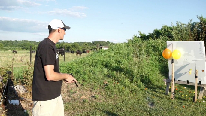 Crazy gin trick shot : Splitting Bullets - World's Most Difficult Trick Shot... Twice in A Row!