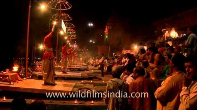 Devotees attend Ganga aarti on ghats of Varanasi