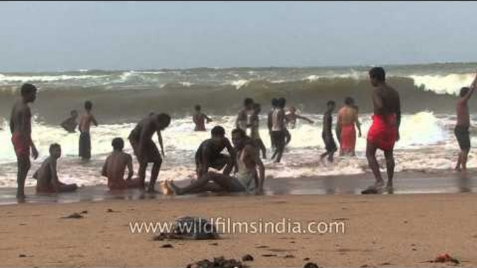 Visitors playing on Puri Beach - Odisha