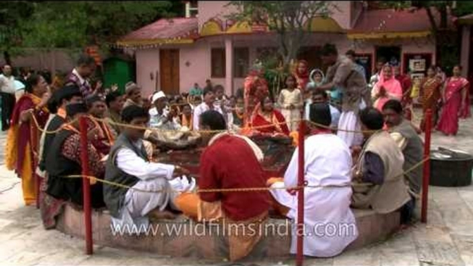 Devotees performing havan rituals at Naina Devi Temple, Nainital