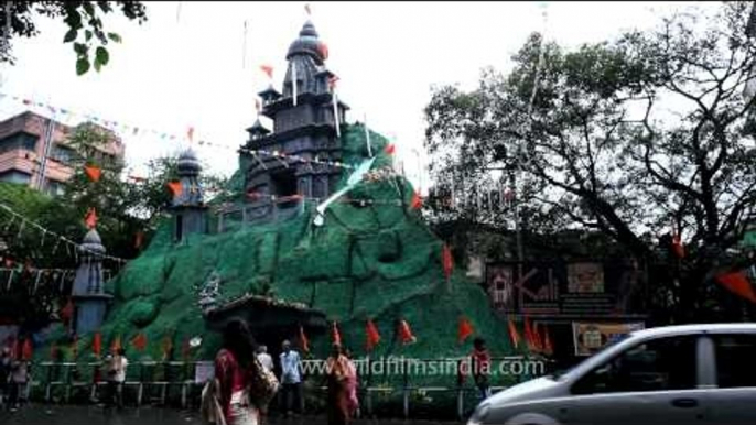 Durga puja pandal themed and created in the form of hindu temple: Kolkata