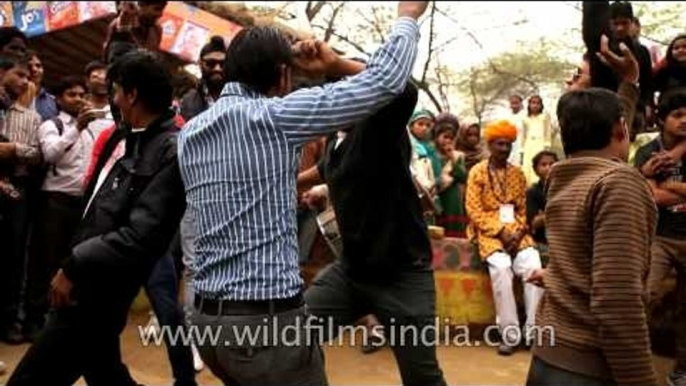 Visitors enjoying desi dhol beats at Surajkund Mela