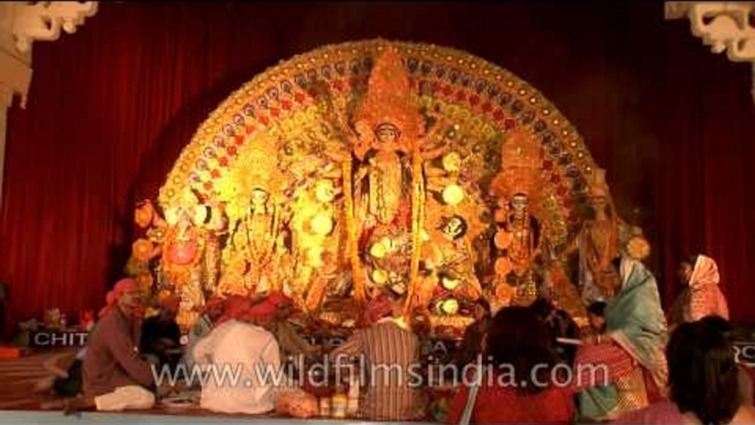 Devotees paying reverance to Maa Durga on Durga Puja