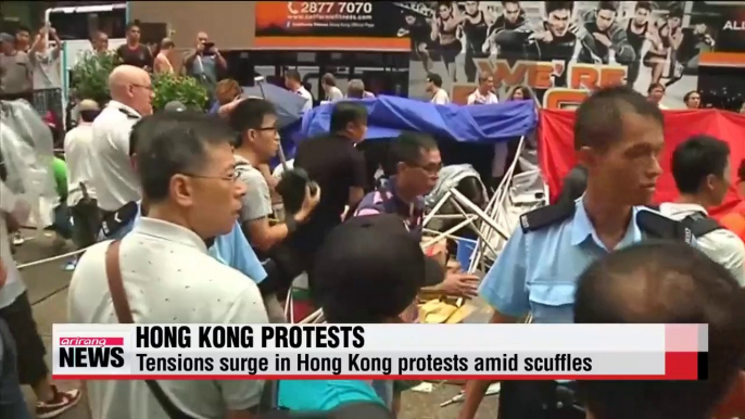 Tensions surge in Hong Kong protests amid scuffles between protesters, opponents