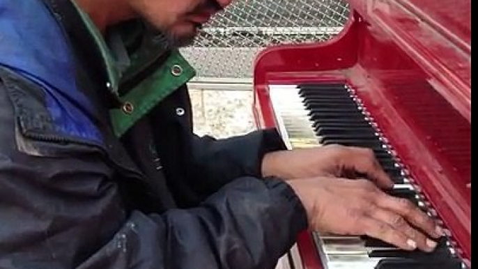 Homeless Man on the street plays beautifully AMAZING