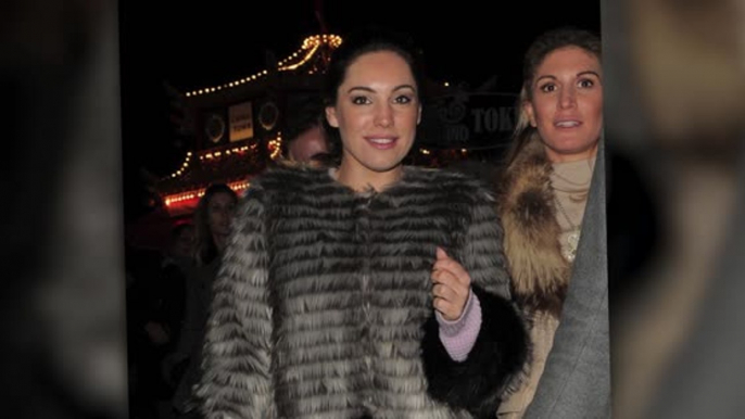 Kelly Brook Returns to London and Gets Festive