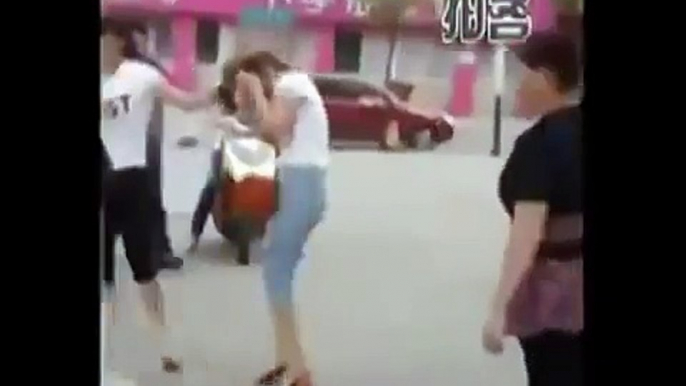 Angry wife beats husband's girlfriend