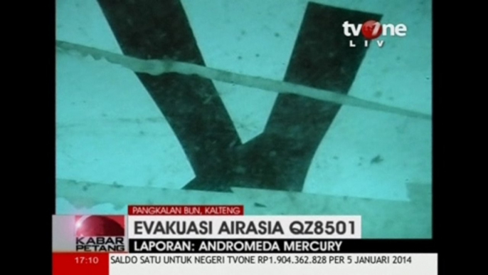 Divers find the tail section of AirAsia flight 8501