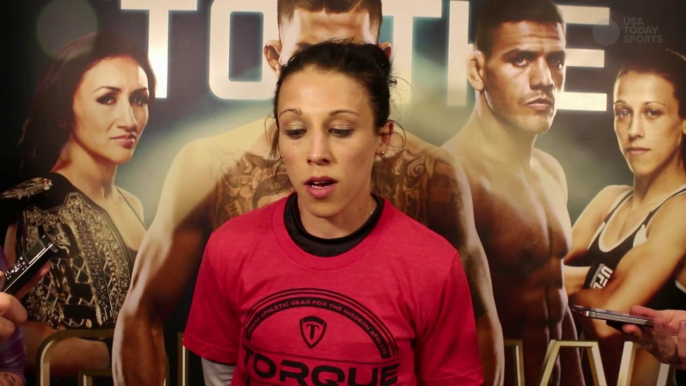 Joanna Jedrzejczyk talks to reporters after UFC 185 workout