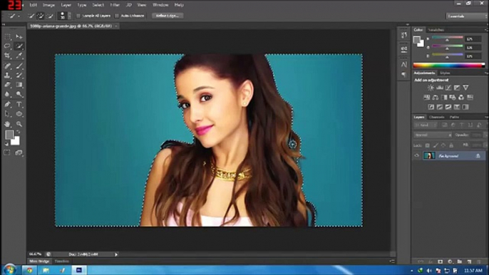 How to remove a background in Adobe Photoshop CS6 using quick selection tool.