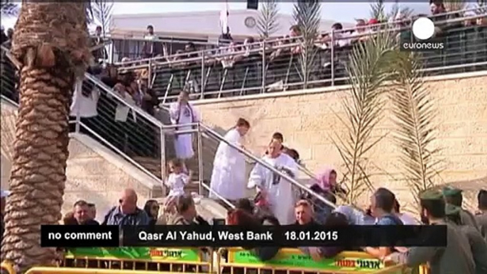 Orthodox Christians celebrate the baptism of Jesus at the Jordan river - no comment