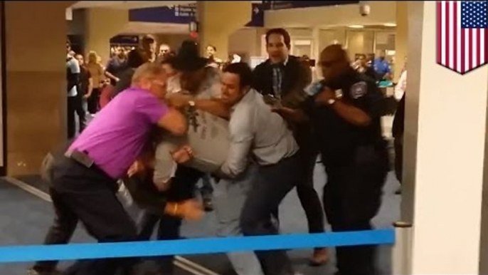 Racist homophobe attacks man for wearing pink shirt, gets taken down at Dallas airport