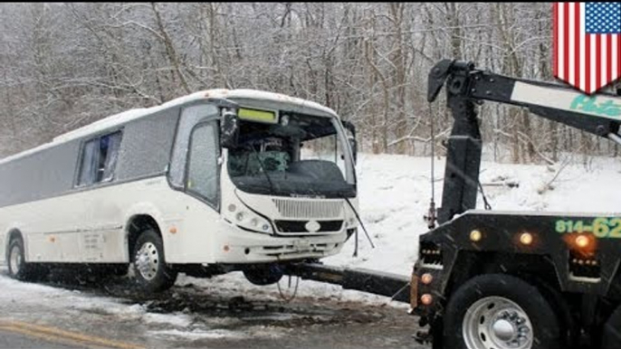 Speeding bus crashes on snowy highway in Pennsylvania, injuring dozens